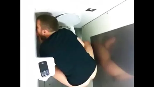 Caught on Camera: Intense Glory Hole Blowjob Action in Public Bathroom Stall – 18+