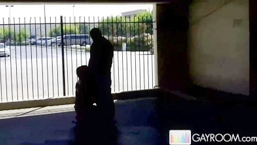 Steamy Encounter: Two Men Share Passionate Blowjobs in Dark Parking Garage – GayXXX